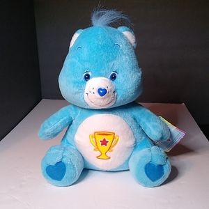 Care Bear - "Champ " . Blue - Trophy Bear - 2004 . Sitting bear . H 12"